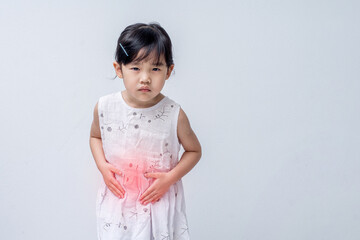 Asian girl stomach ache on white background