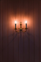 Illuminated Lamps Mounted On Wall In Room