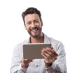 © stokkete - Smiling confident man with tablet