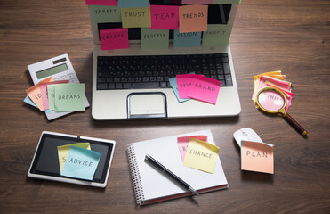 Sticker - Laptop computer with colorful sticky notes. Business