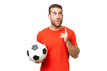 Wall Mural - Handsome young football player man over isolated chroma key background thinking an idea pointing the finger up