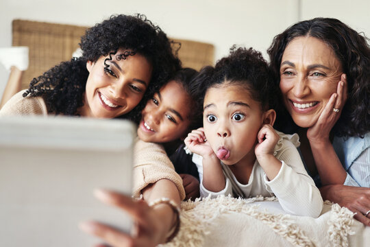 funny, black family home and selfie with mother, kids and grandmother with happy bonding on bed. afr