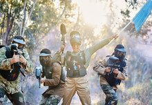 Teamwork, Paintball And Capture The Flag In Celebration For Winning, Victory Or Achievement Standing Together In Nature. Group Of Paintballers Rally Up For Win, Success Or Checkpoint With Guns Ready