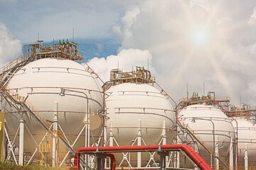 Wall Mural - White spherical propane tanks containing fuel gas pipeline
