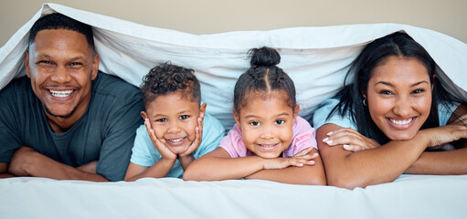 Wall Mural - Love, bed and portrait of family with blanket spending quality time, bonding and having fun on weekend. Happiness, black family and mother with dad and children posing in bedroom to relax in morning