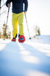 © lightpoet - Snowshoeing in winter in deep snow. Walking in the snow. Hiking in the mountains in winter.