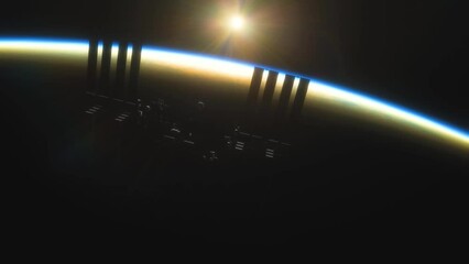 Wall Mural - international space station iss floating in orbit above planet earth in outer space. sunrise or suns