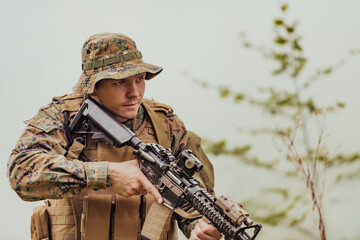 A soldier fights in a warforest area surrounded by fire