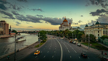 Moscow, Russia - Wide City Street Along The Moscow River With Cathedral Of Christ The Saviour In The Background