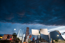 Low Angle View Of Walt Disney Concert Hall Against Stormy Clouds