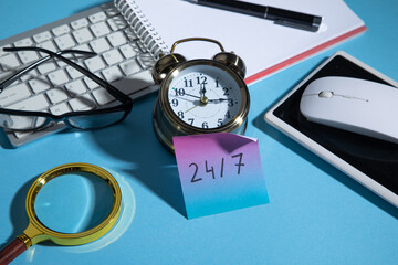 Canvas Print - 24/7 on sticky note with a business objects.
