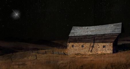 Wall Mural - christmas star rising over an old building