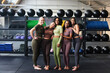 © Flamingo Images - Fit women laughing together in a gym