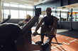 © Flamingo Images - People exercising on rowing machines