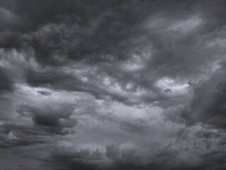 Wall Mural - dark gray heavy clouds. dramatic sky background for design. rainy cloudy windy weather. gloomy atmos