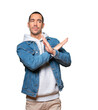 © agongallud - Young man making a gesture of not crossing with the arms