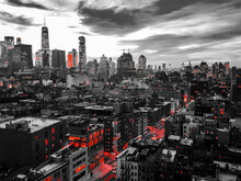 New York City Black And White Nighttime Cityscape With Glowing Red Lights In The Skyline Buildings Of Downtown Manhattan