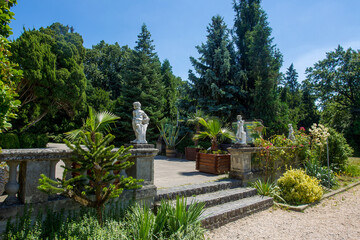  Old statues in  Arboretum Mlyňany  in Slovakia