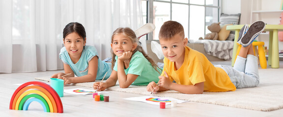 Canvas Print - Little children painting rainbow at home