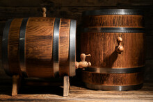 Oak Barrels On Wooden Background
