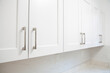 © Jayson - white kitchen cabinet in the kitchen