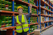 © Washburn - Store clerks inspect products, warehouses, industrial and logistics supply chains.