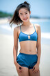 © Surachetsh - young Asian woman in swimsuit is posting on the beach for photo shooting created with generative AI technology
