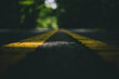 © Cavan Images - Close-up of road markings on street