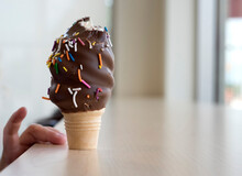 Close-up Of Ice Cream Cone On Table