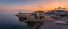 Mediterranean Sea With The Lighthouse At Sunset In The Harbor, Nice, France