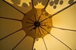 View of yellow parasol from below. Photo generative AI