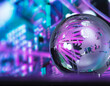 © Westend61 - Crystal globe with fibre optics processing data in background