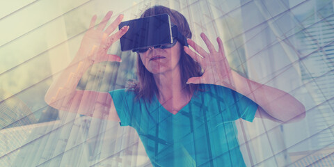 Wall Mural - Woman using a virtual reality headset, double exposure, geometric pattern