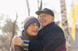 © Westend61 - Happy elderly man embracing woman at park