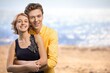 © BillionPhotos.com - Young happy couple family on sea beach background.