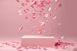 Empty podium with rose petals on a pink background, perfect for product demonstration or showcasing