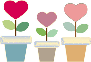 Wall Mural - Three heart shaped flowers with two leaves planted in a pot