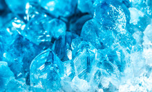 Blue Crystal Mineral Stone. Gems. Mineral Crystals In The Natural Environment. Texture Of Precious And Semiprecious Stones. Seamless Background With Copy Space Colored Shiny Surface Of Precious Stones