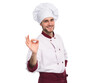 © opolja - Positive professional happy man chef showing tasty ok sign isolated on transparent background