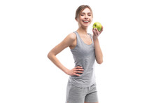 Female Fitness Model Holding Apple. Healthy Eat And Sport Concept