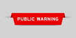 Red color inserted label with word public warning on gray background