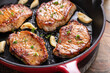 Pork chops cooked in a cast iron pan