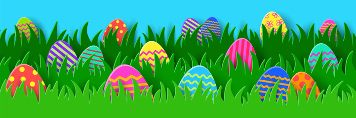 Wall Mural - Colourful Easter eggs hidden in the grass. Paper cut style banner. Panoramic header. Vector illustration