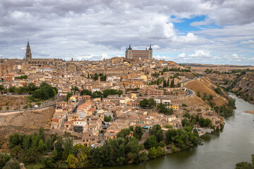 Wall Mural - Beautiful Panoramic of the city of Toledo from a viewpoint across the river on a Summer afternoon