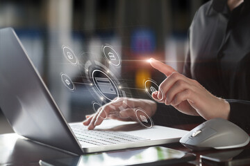 Businesswoman working with virtual card on computer .