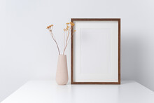 Wooden Artwork Frame Mockup In White Room With Dry Flowers Decor