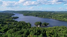 Gatineau River Yacht Club Sailboat Hyperlapse. Lush Green Forest On A Sunny Day With Clouds