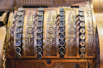 Antique cash register. Close up. Selected focus, shallow depth