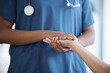 © Wesley JvR/peopleimages.com - Hope, black woman or nurse holding hands in hospital consulting for medical test news or results for sympathy. Empathy, trust or zoom of doctor in healthcare clinic nursing or helping sick patient