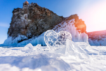 Wall Mural - Ice frozen heart with sun light